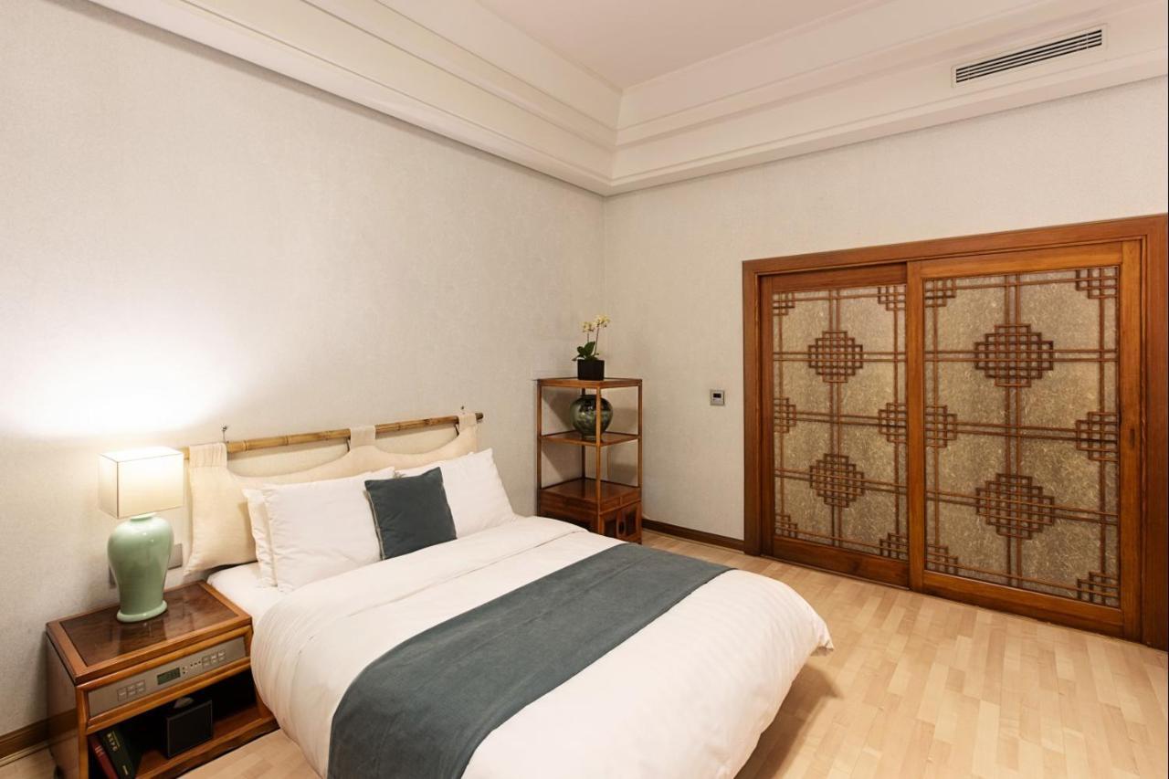 Haeundae Grand Hotel ปูซาน ภายนอก รูปภาพ A bedroom at the hotel