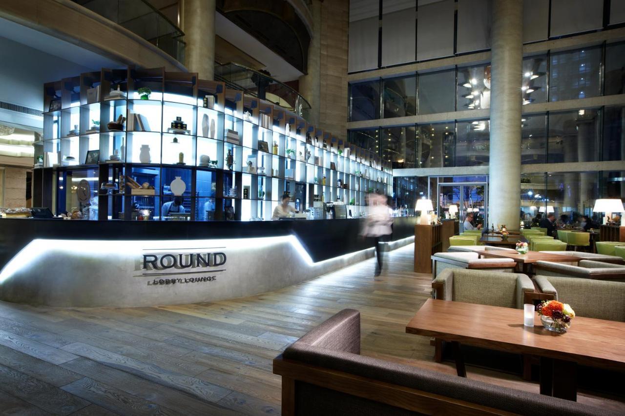 Haeundae Grand Hotel ปูซาน ภายนอก รูปภาพ The Round Lounge at London Heathrow Airport